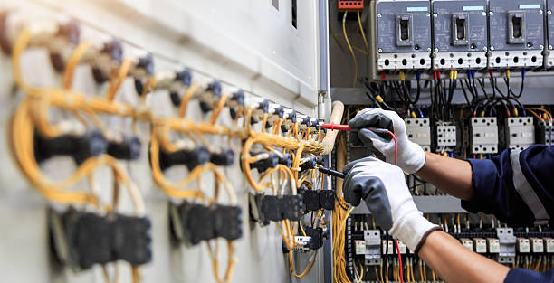 Professional Electrician technician working in Mead, WA
